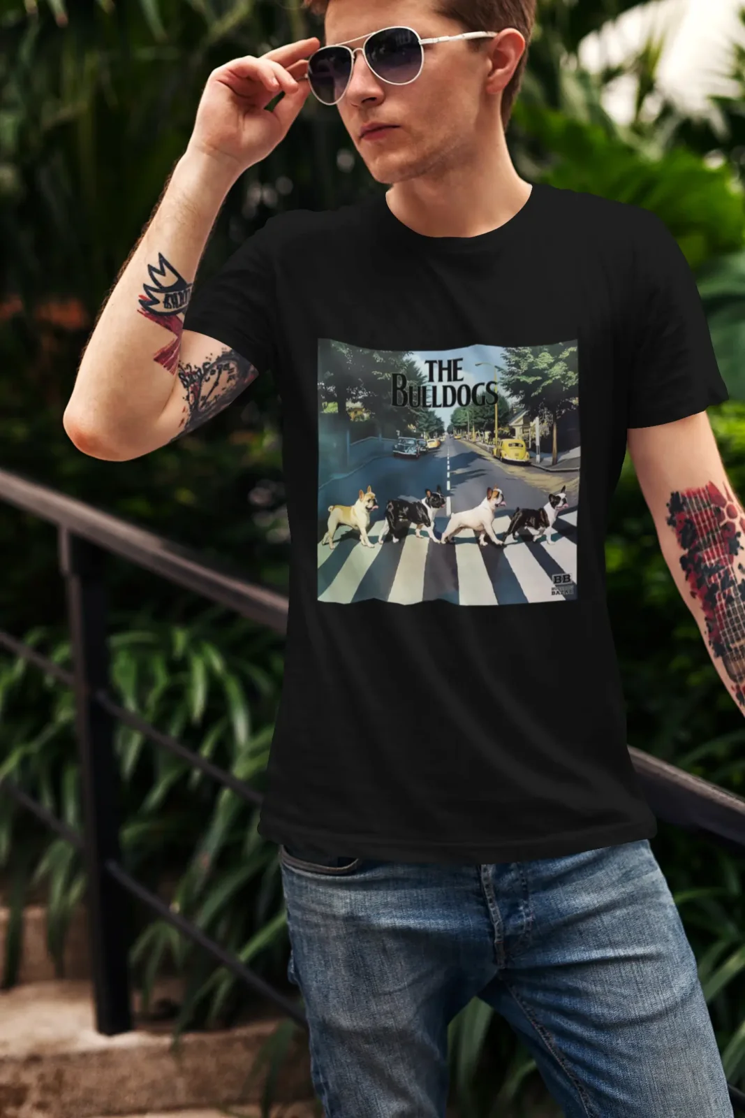Man wearing a minimalist French Bulldog t-shirt in an urban lifestyle setting